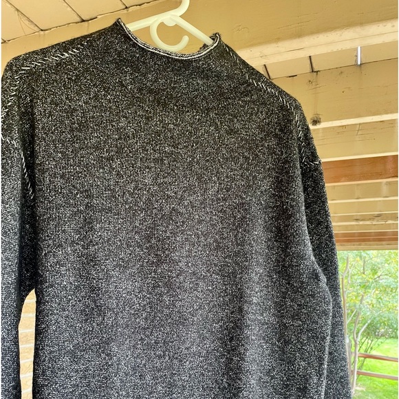Black “barb wired” seam stitched sweater